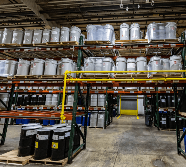Shelves stacked with barrels in a warehouse